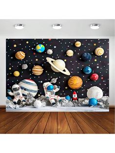 an image of a space scene with planets and rockets on the wall in front of it