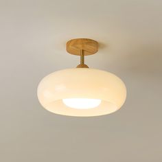 a light fixture hanging from the ceiling in a room