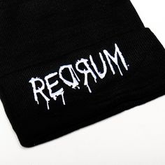 Introducing the Redrum Beanie, a high-quality unisex black acrylic beanie that's both durable and comfortable. Featuring an intricate embroidery design, this beanie is a true statement piece, perfect for adding a bold touch to any outfit. Enjoy lasting comfort and standout style with this exceptional accessory. Letter Print Beanie For Streetwear, Black Beanie Hat With Letter Print, Black Beanie With Letter Print For Winter, Unisex Black Beanie Hat, Black Beanie With Letter Print For Streetwear, Black Cotton Beanie Cap, Fitted Beanie For Streetwear, Trendy Black Adjustable Beanie, Trendy Adjustable Black Beanie