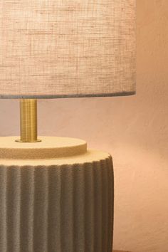 a lamp that is on top of a table