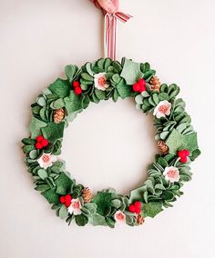 a christmas wreath hanging on the wall