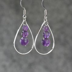 "The tear drop hoop earrings are handmade using amethyst, or coral, or turquoise. Free US shipping. Customers who purchased this item said: \"Very pretty, love these earrings \" The length of the earrings is 1 inches, or 2.5cm. (excluding the length of hook) Earrings are worn so close to the face, they are the most important accessories because it will siphon attention to our face. Earrings can compliment our face shape, enhance our good features, soften the jaw line, bring out the color of the Round Beaded Earrings With Natural Stones As Gift, Round Natural Stones Beaded Earrings As Gift, Crystal Hoop Earrings Gift, Dangle Beaded Earrings For Gifts, Hoop Crystal Earrings For Gifts, Hoop Earrings With Round Natural Stones For Gift, Purple Nickel-free Teardrop Dangle Earrings, Gift Hoop Beaded Earrings, Wire Wrapped Teardrop Hoop Earrings