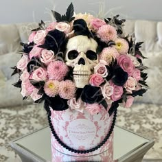 there is a skull with flowers in it