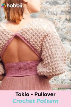 the back of a woman's sweater with text overlay