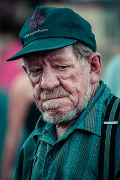 an old man with a hat on his head