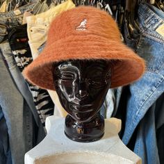 Kangol Furgora Bucket Hat - Mahogany Trendy Brown Bucket Hat With Flat Brim, Trendy Brown Flat Brim Bucket Hat, Casual Brown Bucket Hat With Curved Brim, Trendy Brown Bucket Hat With Curved Brim, Casual Brown Wide Brim Bucket Hat, Vintage Brown Bucket Hat One Size, Brown Casual Cloche Hat One Size, Casual Brown Cloche Hat, Casual Brown Bucket Hat For Fall