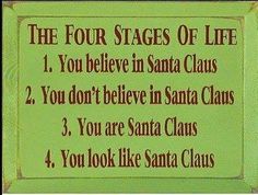 the four stages of life sign in front of a green background