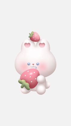 a white cat holding a strawberry in its paws