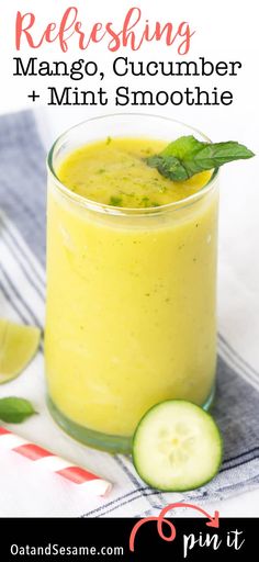 a cucumber and mint smoothie in a glass with the text refreshing mango, cucumber + mint smoothie