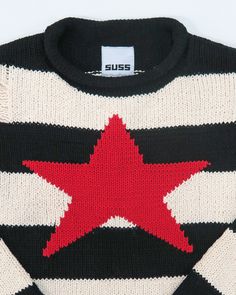 The Stripe Star Sweater is knit in 100% Brazilian cotton on the hand loom. It is knit in a chunky stripe and features unique hand-made drop stitches throughout. The Star Sweater is finished with our signature throwback roll neck and rolled edges on the cuffs and bottom. The intarsia star is worked by hand on the loom in the knitting process. Unisex sizing Content is 100% Brazilian Cotton. Knit locally in Los Angeles. This sweater is specially made to order. Please allow 4-7 business days to knit Star Sweater, 90s Aesthetic, Hand Loom, Roll Neck, Cotton On, The Loom, Cotton Knit, The Star, Loom