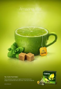 a cup of green tea next to cubes of sugar and mint on a green background