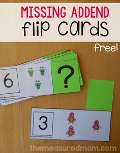 the missing addend and flip cards are displayed on a wooden table with green paper