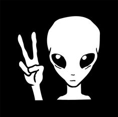 an alien is making the peace sign with his hand