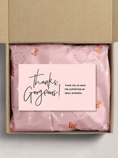 a pink box with thank you gorgeous written on it