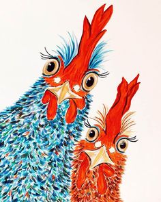 two red and blue roosters standing next to each other