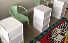 three children's chairs and two tables in a room with a rug on the floor