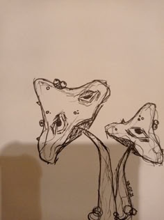 a drawing of two giraffes standing next to each other