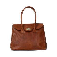 The Antonella Tote Bag is a office-appropriate carryall and that 'something sleek' for your 9-to-5 routine. The stunning cognac leather will develop an authentic patina over time, making it even more luxurious looking. Comes with Hektor + Helena's Lifetime warranty and guarantee. Made of Italian vegetable tanned leather, our bags are all handmade by master craftsmen who have been perfecting their skills for generations. The result is a striking blend of rich earth-toned colors, providing a glowi Earth Tone Colors, Back In Stock, Longchamp Le Pliage, Vegetable Tanned Leather, Tan Leather, Cognac, Patina, Dust Bag, Top Handle Bag