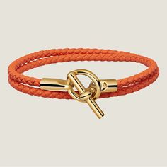 Glenan Double Tour Bracelet Color: Orange Size: T2 Ref: H071689f 93t2 Braided Double Tour Bracelet In Swift Calfskin With Gold-Plated Glenan Closure. Made In Italy Wrist Size From 5.7" To 6.1" | Braid Width: 0.12" Hermes Leather Bracelet, 1 Braid, Hermes Bracelet, Hermes Orange, Hermes Jewelry, Hook Bracelet, Leather Chokers, Enamel Bracelet, Gold Orange