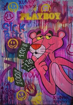 a painting on the side of a building that has graffiti written all over it and an image of a pink mouse