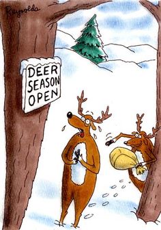 two deers are standing in the snow near a sign that says deer season open