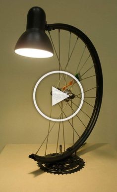 an image of a bicycle wheel with the spokes spinning in front of it on a table