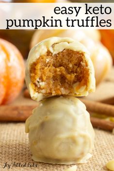 an easy keto pumpkin truffles is stacked on top of each other