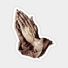 a sticker depicting the hands of an old man with his hands folded in prayer