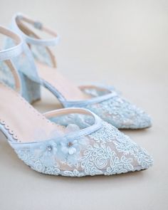 "Crochet Lace Wedding Shoes Collection. Classic and refined almond toe crochet lace with added flower appliques. The perfect shoe for a spring or summer wedding, bridesmaids, bridal party, or any special occasions. The light blue color can easily be your something blue. DETAILS: HEEL HEIGHT: 2.75 inches COLORS AVAILABLE: Ivory, White and Light Blue UPPER: Synthetic upper and lining MATERIALS: Manmade outsole STYLE NAME: ABBY  SIZE FIT: RUNS LARGE  Not sure of which size to purchase? Shoes measur Summer Wedding Bridesmaids, Block Heels Wedding, Light Blue Crochet, Lace Wedding Shoes, Blue Bridal Shoes, Ivory Bridal Shoes, Flower Girl Shoes, Wedding Shoes Lace, White Wedding Shoes