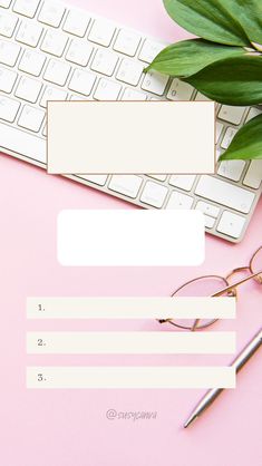 a computer keyboard, eyeglasses and plant on a pink background