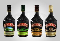 three bottles of bailey's irish chocolate liqueur are shown in this image