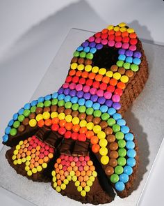 a chocolate cake decorated with colorful candies