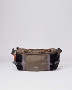 an image of a fanny bag in grey and black with orange accents on the side