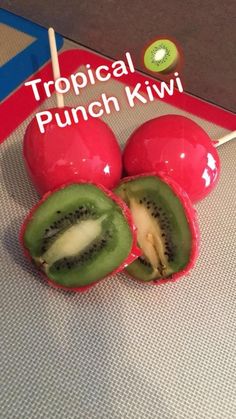 three pieces of kiwi sitting on top of each other with the words tropical punch kiwi above them