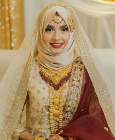 a woman in a wedding outfit is smiling for the camera