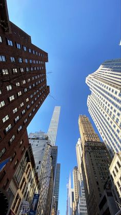 looking up at skyscrapers in new york city