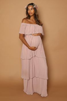 The Lala Layered Gown is flowy, flirty and flattering, with her off the shoulder detail and flowing pleated fabric the Lala Gown having you looking chic but also feeling comfortable. Color Options: Mauve Pink, Royal Blue, Blue Floral, Pink Floral, White Floral Jumpsuit Pregnant, Pink Baby Shower Dress, Babyshower Dress, Maternity Evening, Pink Maternity Dress, Layered Gown, Cute Maternity Dresses, Plus Size Maternity Dresses, Maternity Dresses For Baby Shower