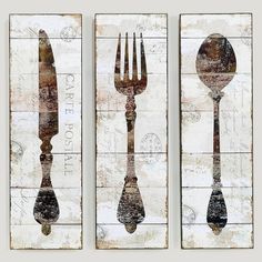 three forks and spoons are displayed on wooden panels with the words love is in the air