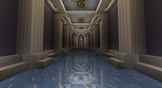 an empty hallway with columns and chandelier