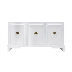 a white cabinet with three doors and two gold knobs on the front, against a white background