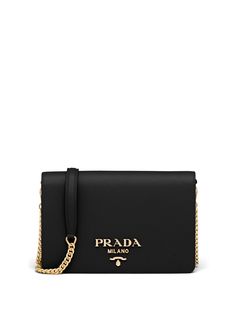 black leather Saffiano leather gold-tone logo lettering internal logo patch gold-tone hardware foldover top with magnetic fastening leather and chain-link shoulder strap main compartment Prada Bag Shoulder, Handbag Branding, Prada Chain Bag, Black Prada Bag, Prada Bag Black, Prada Shoulder Bag, Prada Saffiano, Luxury Purses, Fancy Bags