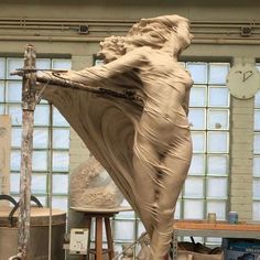 a sculpture is being made in an art studio