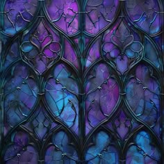 an ornate stained glass window with blue and purple colors