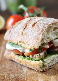 a close up of a sandwich on a cutting board