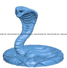 a blue snake statue sitting on top of a white surface