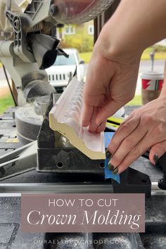 a person using a tool to cut crown molding on a piece of wood with text overlay that reads how to cut crown mold