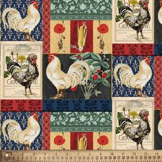 a quilt with roosters and flowers on it