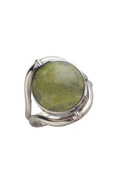 a silver ring with a green stone in it