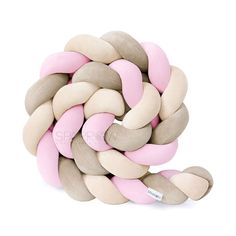 a pile of pink and white doughnuts sitting on top of each other