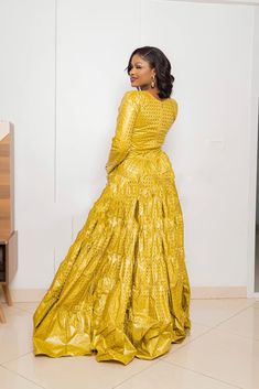 Festive Yellow Ruffled Dress, Gold Floor-length Dress With Ruffles, Fitted Gold Gown, Festive Gold Ruffled Dress, Festive Gold Ruffle Dress, Festive Gold Dresses With Ruffles, Gold Dresses With Ruffles For Festive Occasions, Gold Fitted Long Dress Gown, Yellow Long Sleeve Party Gown